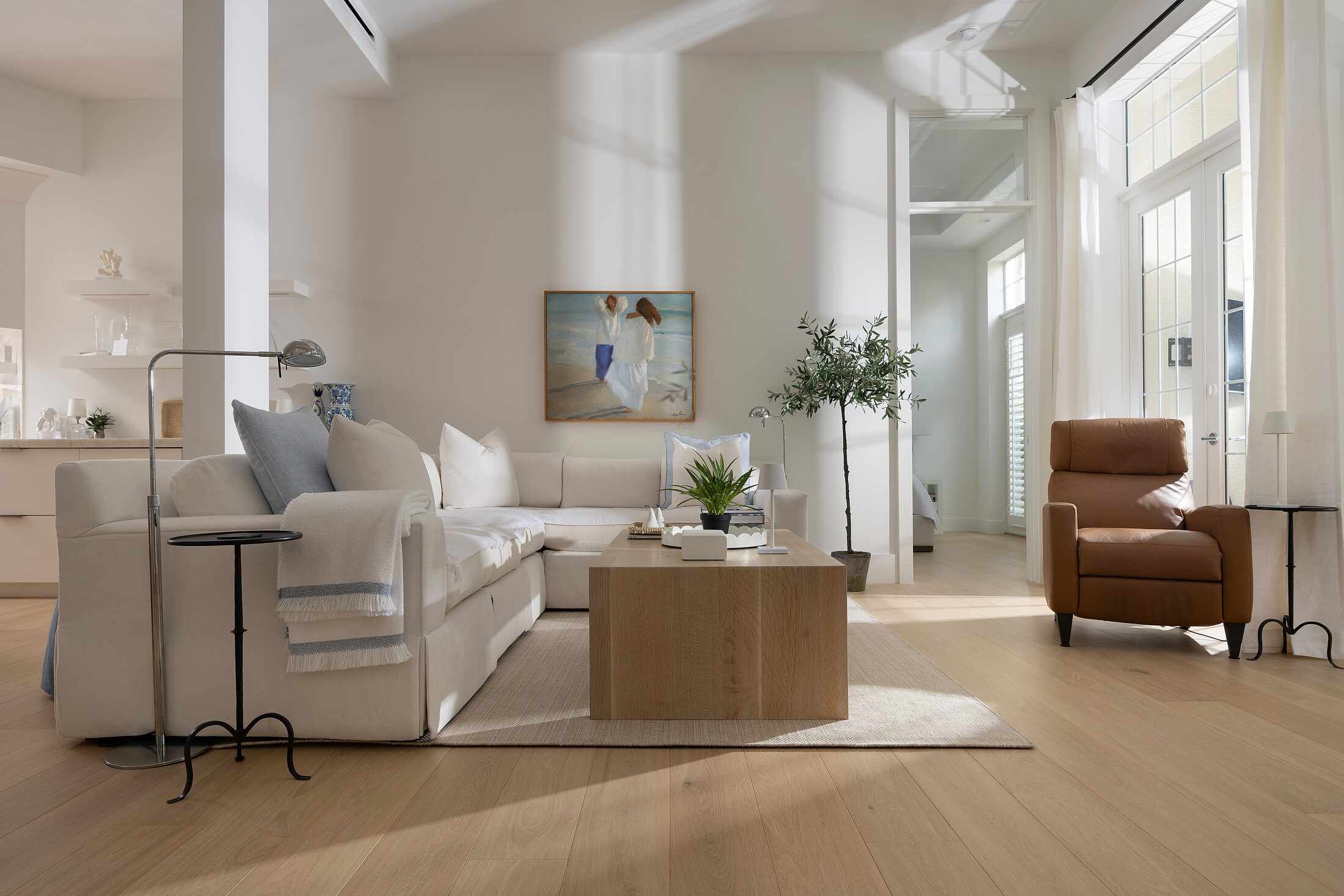 7th Avenue living room with hardwood flooring