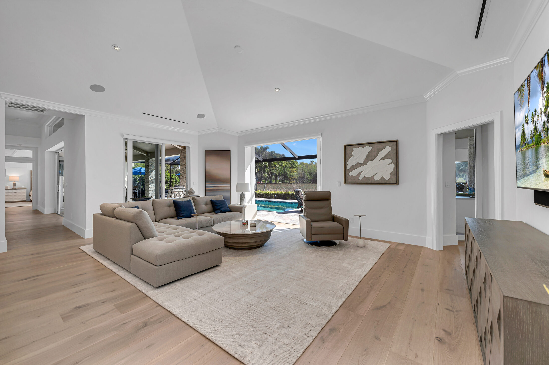 Finished home in Pembroke Point, Naples. Wide European white oak, entry to great room.