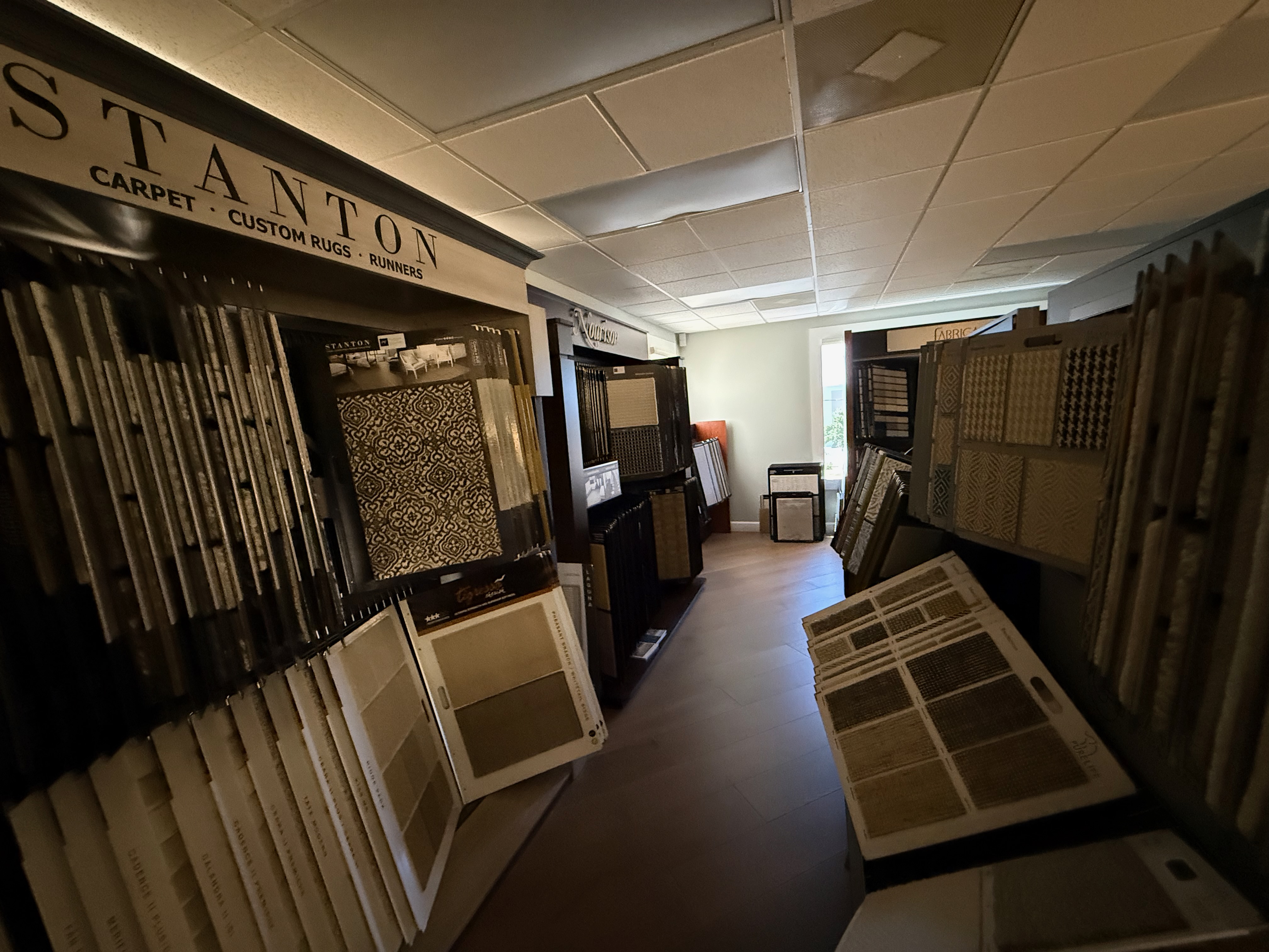 Stanton, Nourison, and Fabrica rug displays at the ProFloors showroom