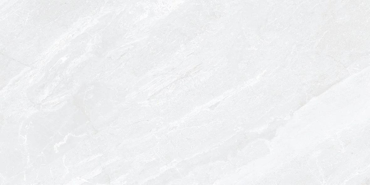 A bright, consistent engineered-quartz slab like Cambria — the no-maintenance companion